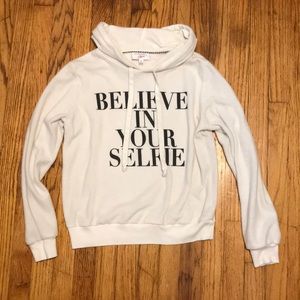 Hooded “believe in your selfie” sweat shirt